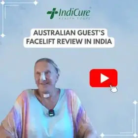 A headshot of an Australian guest named Louis Hones, The image promotes her facelift review in India with IndiCure.